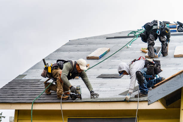 Professional Gutter Installation technician working in Riverside, CT